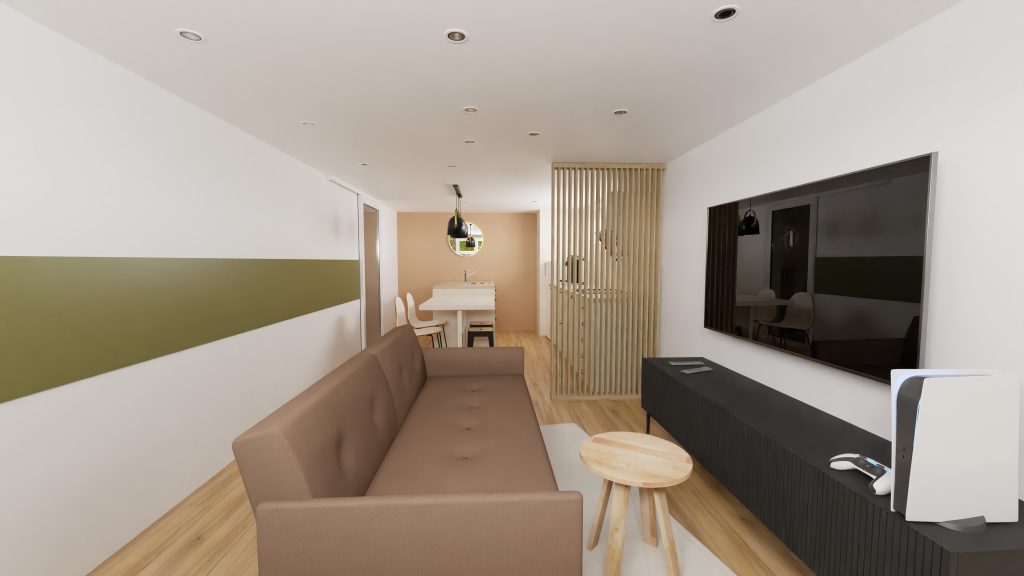 Espace ouvert salon cuisine aux couleurs simples et vives