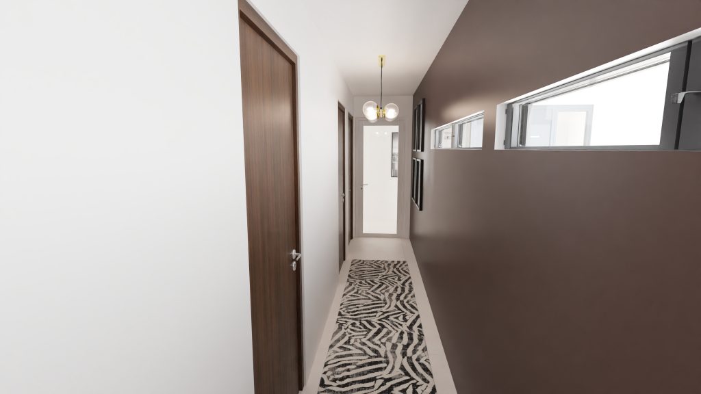 Couloir lumineux peint sur un côté du mur, de la même couleur que les portes en bois pour un rappel et un couloir de caractère
